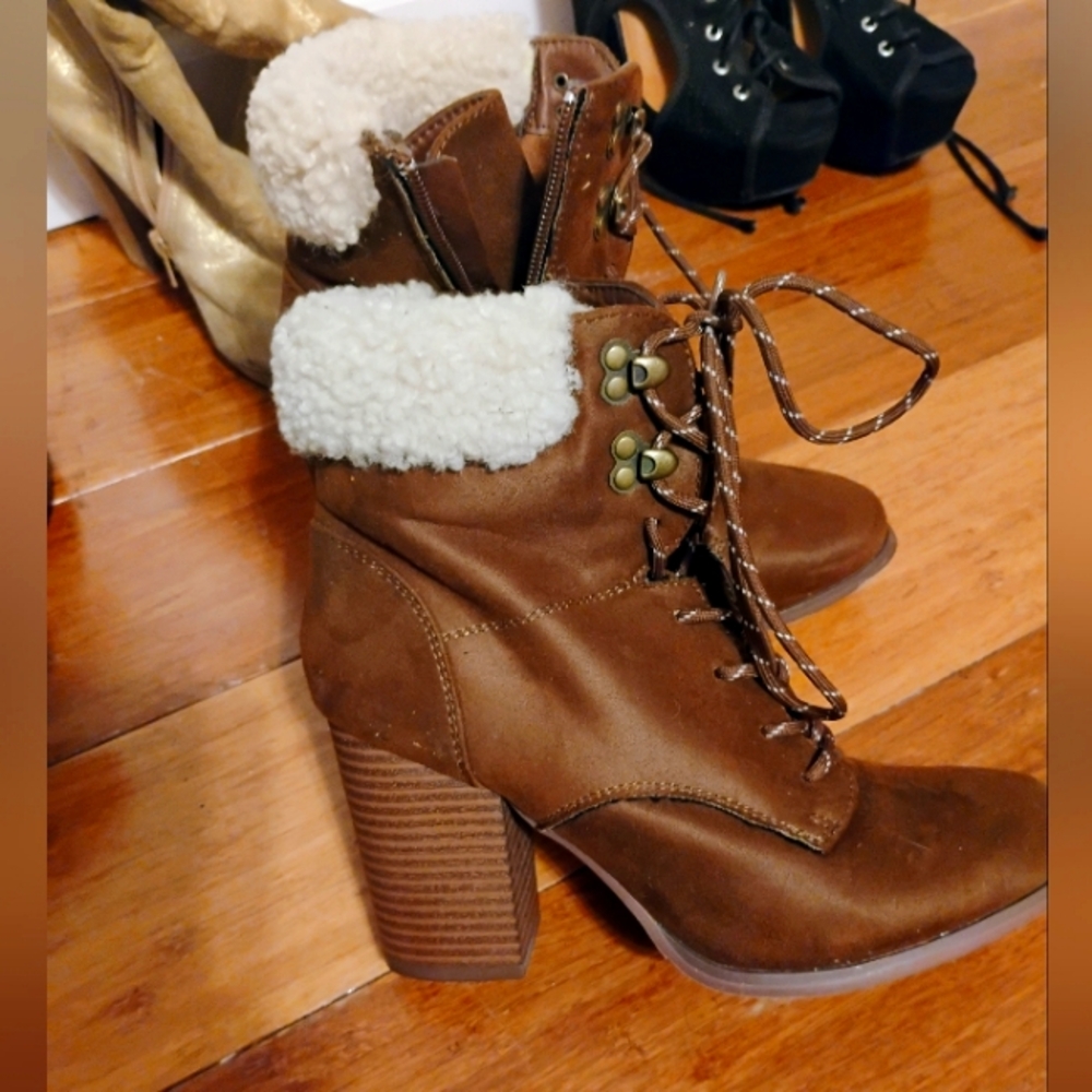 Brown high heeled boots
